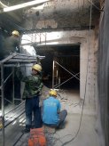 **市公安局剪力墙绳锯开洞及包钢加固工程
